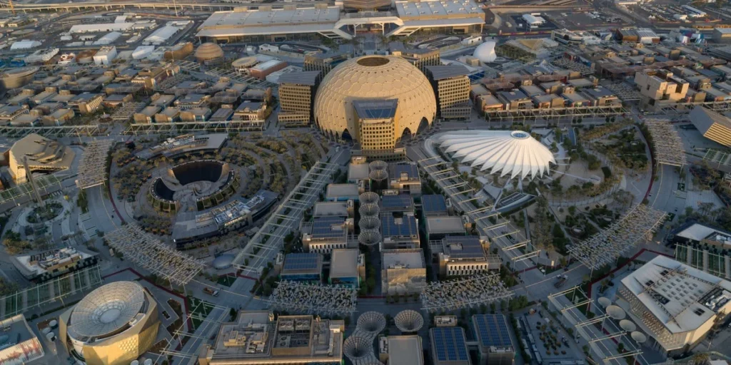 Aerial view of Expo City Dubai showing the Al Wasl dome and surrounding innovation districts.